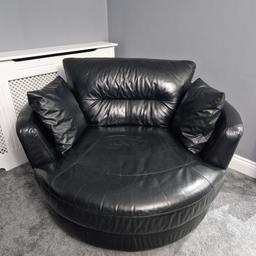 Mint condition swivel cuddle chair in genuine black leather from DFS. Paid £850 around 4 years old but hardly used was a late addition to a corner sofa. comes with genuine leather scatter cushions. diameter 125cm x height 80cm. Metal base can be removed to reduce height and make easier to move. #summersale