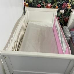 Cot bed complete with mattres in good condition
One side was there temporary comes complete..