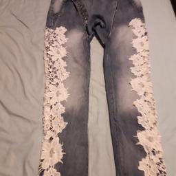 WOMENS LIGHT BLUE HAREM BOYFRIEND JEANS WITH WHITE LACE DOWNSIDE BOTH OF LEGS .
VGC .
NO TIME WASTERS