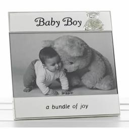 ***LAST REMAINING UNIT***

NEW BABY BOY MESSAGE PHOTO FRAME 6" x 4" 

Baby Boy Message Photo Frame. A quality free standing photo frame, wording at the top "Baby Boy". Wording at the bottom, " A Bundle of Joy" The photos frame has a decorative teddy bear on the top right hand corner which has a diamante belly, to give the frame a touch of class! Holds photos 6" x 4".

Height of frame 6.5" 

This frame would make an excellent and ideal gift to someone having had a new born child. 

BRAND NEW & UNUSED! 

#baby #photo #frame #bling #cute