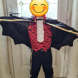 Halloween vampire costume 
Pants / cape / velcro neck waistcoat (front only)
Age 7-8