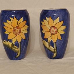 Homeware / Ornament / Decorative / Art/ Bargain
Pair of Regency Fine Arts Hand painted
Fine Porcelain 8” Vases 
Blue with Sunflower Design
Size 20 x 11 x 6 cm each
For Condition, please See photographs
From a clean smoke free home
(308)
Any Questions please ask 
I Sell New, Vintage and Pre-Owned items,
Some have expected wear, minor marks etc.
Please check Photos before purchasing.
I am also selling various other items have a look.