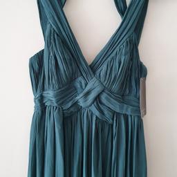 New with tags
Will suit medium hight to tall person size 8
(though the label is xs)
Otherwise need to tailor the straps and length
Colour is a beautiful dark turquoise blue
It has lining