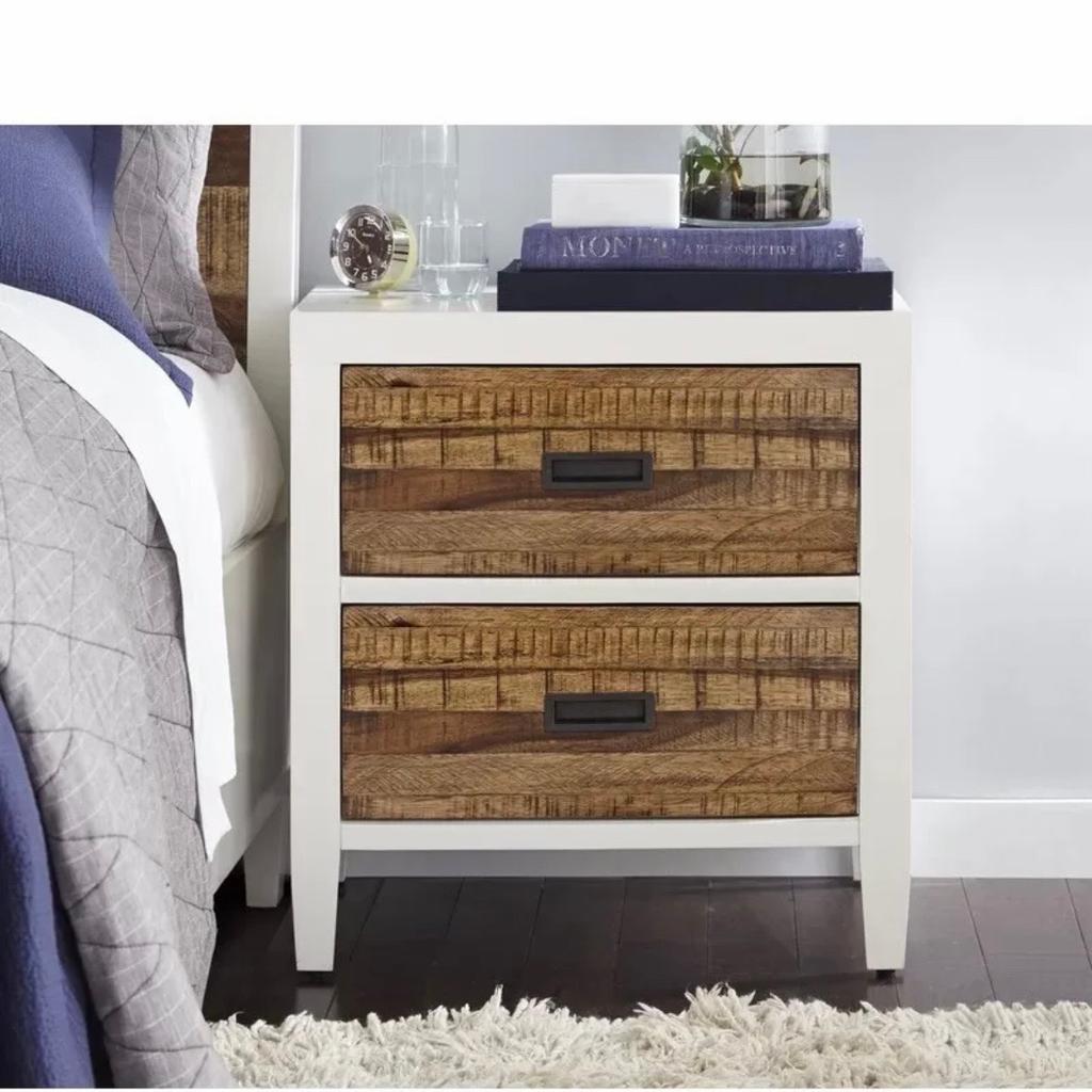 SET OF 2-

BENDIGO 2 DRAWER NIGHT STAND.

RRP FOR TWO: £574

Collection only, or local delivery.

**Ready assembled**

Inspired by modern Scandinavian design, this 2 Drawer Bedside Table lends minimalist appeal to your bedroom ensemble. Each drawer features an antiqued bronze flush pull, smooth-gliding metal runners, and a full extension. The top drawer offers ample storage space for a notepad, flashlight, and your spare pair of reading glasses, while the bottom drawer provides plenty of room for pajamas, socks, and a lock box for valuables. To create an understated ensemble in the master suite, start by rolling out a diamond shag area rug to define the space, then set one of these nightstands on each side of a low-profile teak panel bed. For the perfect finishing touch, top each nightstand with a tarnished gold gourd lamp to illuminate late night reading sessions and breakfasts in bed
