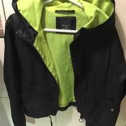 Lovely black jacket thin lime green inside hood zip fastening and pocket pull string on bottom immaculate condition pick up