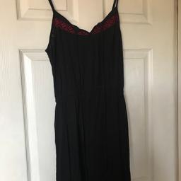 Size 12
Great for summer as its super light & cool wearing.
See photo 2 for the bottom of the dress
As some decorative red piping on front
Adjustable straps

NO OFFERS