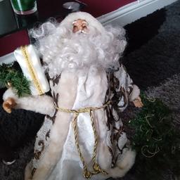 18" tall Santa holding gift and tree. Gold trim .
Comes from a smoke and pet free home
I have several assorted bargains listed if you fancy browsing.
