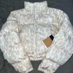 ■ PRICE: £235

■ SIZE: SMALL (SIZE 8-10)
▪ Ask for measurements - if needed

■ CONDITION: NEW
▪ Still with tags
▪ Selling as Sister bought the wrong size but took too long to return it

■ INFO: 
▪ Brand: The North Face
▪ Colour: Ivory with a leopard print pattern
▪ Style: Cropped length
▪ Zip fastening, side pockets + 100% polyester
▪ Bought for £235+
▪ Cash on collection

---

Tags: manchester Gorton Ashton Denton Openshaw Droylsden Audenshaw hyde tameside north west salford ancoats stockport bolton reddish oldham fallowfield trafford bury cheshire longsight worsley nuptse jacket nuptse coat winter down coat coats jackets ladies womens size 8 size 6 size 10 north face white