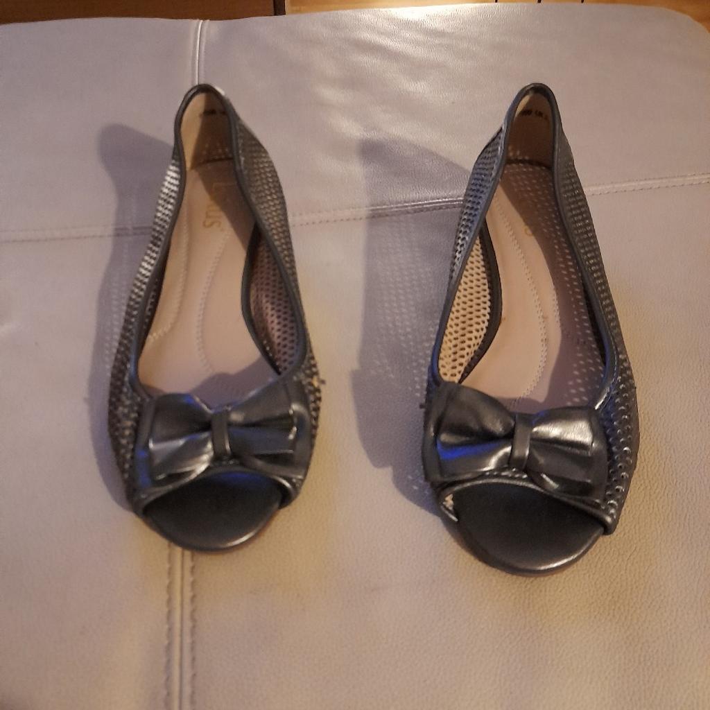 Gun metal grey metallic, peep toe small wedge sandals with laser cut holes to the main body of the sandal. worn once for a wedding. Can be collected from NW5 or post via Evri.