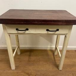 A charming, small, vintage table/desk with drawer.
Made from solid pine, with chamfered legs and original iron handles.
The top is made from 3cm thick, solid mahogany.
In solid, sturdy condition, would benefit from a lick of paint.
Measuring 75.5cm wide, 45cm deep, 77cm high.
Delivery available