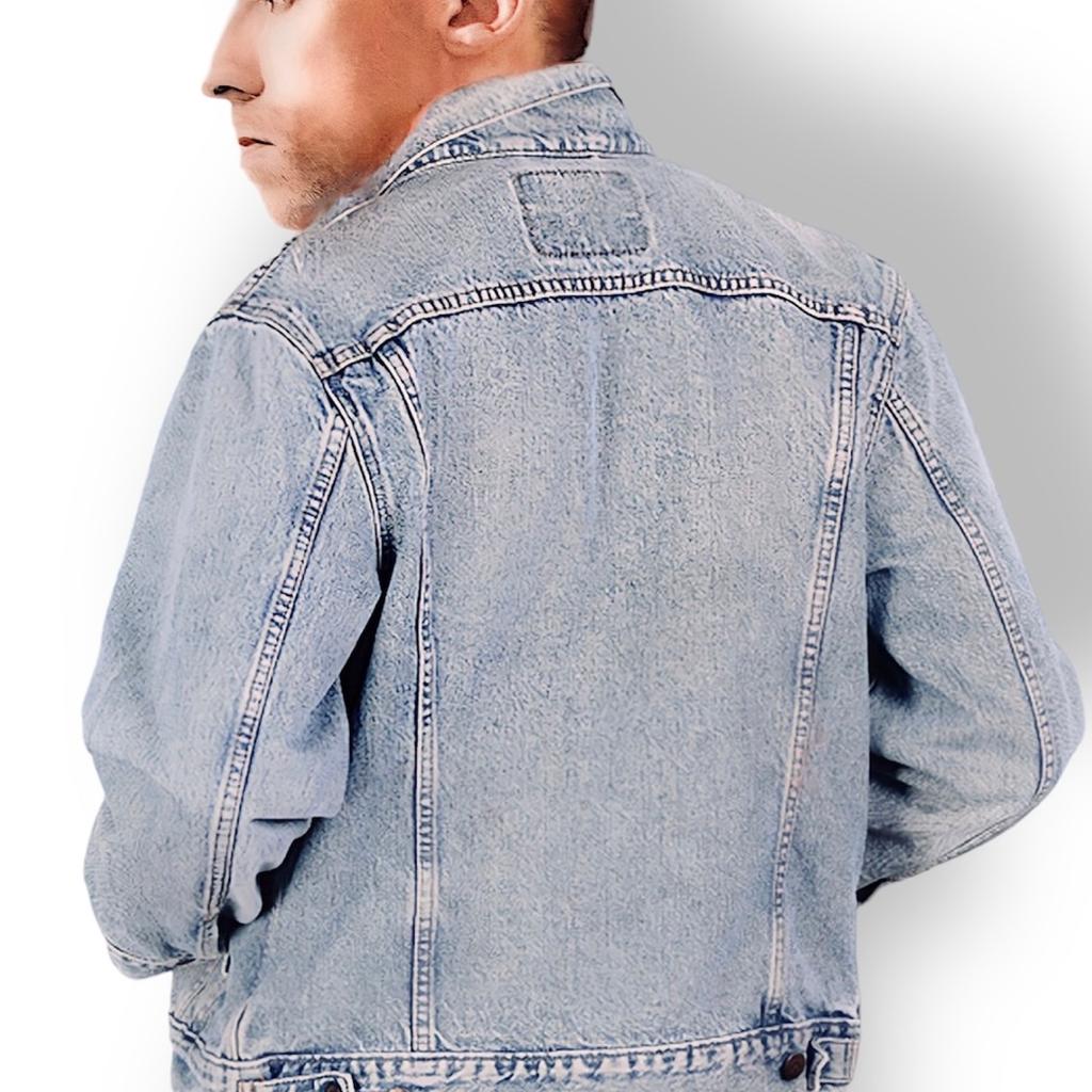 Excellent condition (Grade A)
Size S (42")
A Trucker Jacket makes an outfit—and its style endures beyond seasons and trends. Meant to be worn forever, wherever, whenever, you’d be hard-pressed to find a jacket with an easier shape, more versatile weight or inherent sense of cool.
Color: Light Stonewash - Distressed
The original jean jacket since 1967. Gets better over time with natural fading, stains and holes
* Standard fit
* Hits at hip
* 100% cotton denim
* Non-stretch
* Point collar
* Front button placket
* Standard button fastening on the man's side
* Long sleeves with button closures at cuffs
* Button-flap patch pockets at chest and welt side pockets
* Side hem adjusters
* The Levis label and red tab are present.
* Wash your Trucker Jacket sparingly. Machine washable.
Check the photos. There may be light/faint marks in places incl. pocket edges, collar, cuffs and seams. That's the beauty of a vintage Levi's distressed stone-washed j