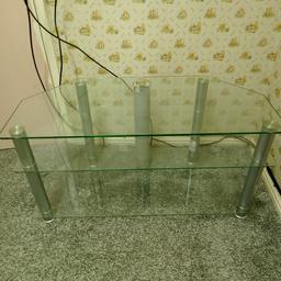Hardly used table. large with 3 glass tiers. plenty of space to put your games, DVDs, sky box and many more things.

in new condition.

has a middle compartment to neatly put all the cables in.

very nice, would look good in any room.

collection from Bolton.