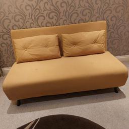 Mustard sofa-bed from Made, 6 months old. immaculate condition from a smoke and pet free home. Cost £500 new
