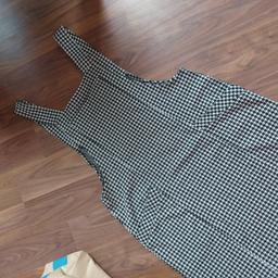 ladies dog tooth black and white checked pinafore dress with pockets only worn once good clean condition.Size 8 £4.50 collect only.