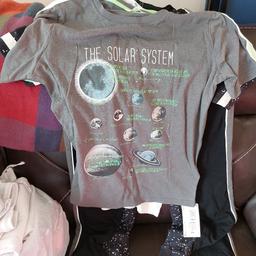 Boys pyjamas twin set, aged 12-13 from m&s , space theme , brand new never worn, bought wrong size, excellent Christmas present. paid £24.