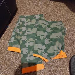 Boys pyjamas in an army style with orange trim, lovely and soft, excellent condition aged 11-12