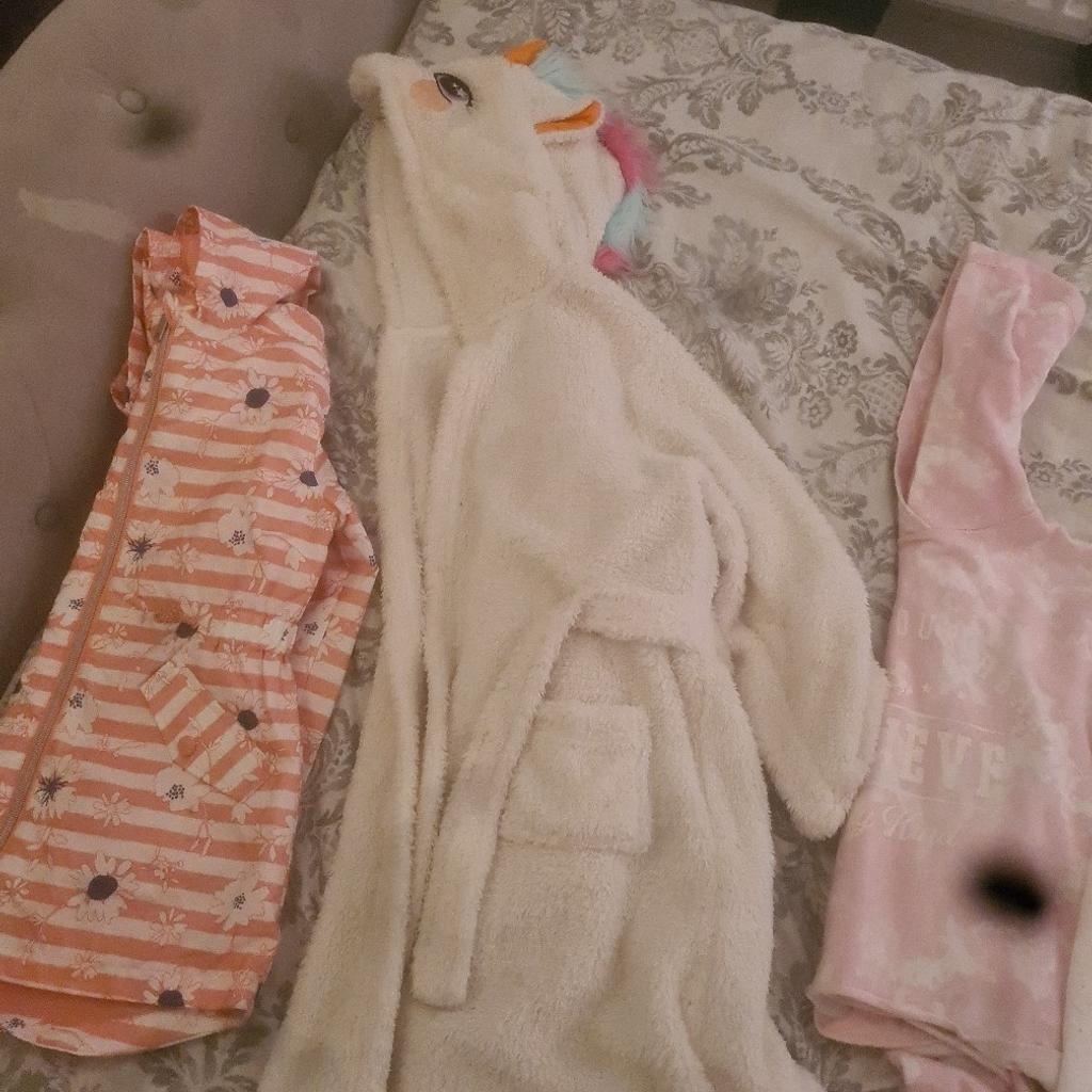 1 unicorn dressing gown a waterproof parka 2 dresses and a hoody age 8-9 years