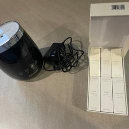 Hardly used Electronic aroma diffuser-Dimplex DXAD100 with colour changing base and clock. Will come boxed including 6 brand new essential oils.