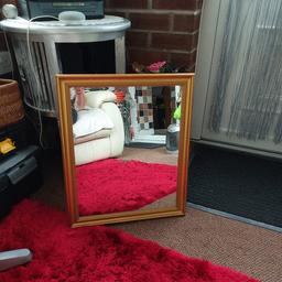 Lovely Bronze/Gold Colour Mirror. sz 24inches x 20inches no marks or chips.make an ideal gift.