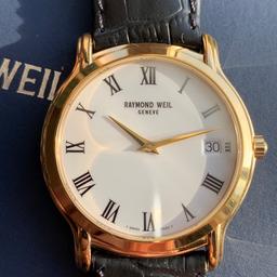 Mens excellent condition Raymond Weil Geneve Tradition quartz watch. Model 5569. 38mm case. 18ct gold plated. In good working order. Original leather strap in good condition securing well. Comes with box and papers. Will post special delivery. Thank you.