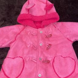 Pink George coat, age 6-9 month, excellent condition, from a smoke and pet free home, pick up.