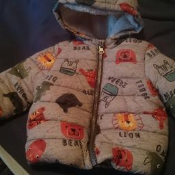 FRED FLO CHILDS puffa coat fleece inside for comfort elasticated cuffs and round the bottom zip up fastening hood with ears on age 6_9 months collection only bb26dh