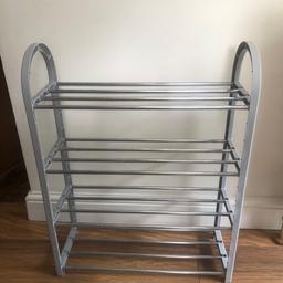 4 tier high shoe rack in grey 
Measures approx 64cm high by 50cm wide and 18cm deep
In good, used condition 
From a smoke and pet free home 
Collection only from DY5 area