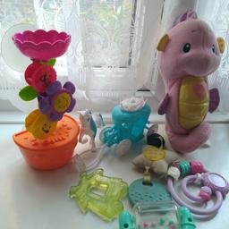 Mixture of Toys. teether,toys to hung on prams, cuddling sea horse. Sea horse needs battery.