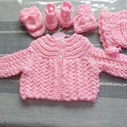 PLEASE ASK IF ANY IN STOCK,GOING BE KNITTING OTHER COLOURS
Candyfloss pink Available
Baby Pink Available
white Available

DOLL NOT INCLUDED
ONLY KNITTED SET
ORDER COLOUR PLEASE
Please pay on order
ALLOW TIME TO KNIT
AVERAGE 2 WEEKS
NO ORDERS AFTER END NOVEMBER
White gift box £3 Extra see last photo

16" Newborn Mia Set
Lacy Matinee Yoke Style see photos
Bonnet with Booties Mittens

PLUS T BAR SHOES
Knitted in D-knit
 Candy Floss Pink
Chest 16"
3 Buttons
Length back neck to hem 10"
 Sleeve Under Arm 5.5"
Hat Head Circumference 16"
Depth 6"