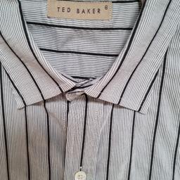 Men's Smart Ted Baker Shirt

In excellent clean condition

Pleae note the material has a slight stretch giving it a slightly wrinkled appearance even after ironing

Ted Baker Size 6

From a smoke free home

Collection Only
