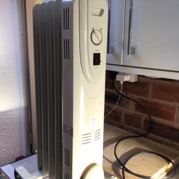 This is a small oil heater. Hardly used. Smoke and pet free home
