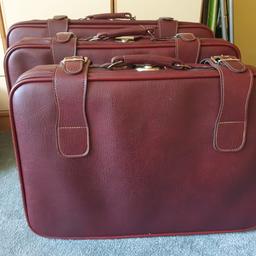 Up for sale are 1970s faux leather red brown coloured Suitcases.

These are all clean inside and very good condition for their age.
A few minor cosmetic marks as can be seen in pictures, please use your best judgement.

These are beautiful and a reluctant sale.
Good for travelling or for a statement piece in a guest bedroom.

Measurements (in inches)
Large
L28 W20 D8

Medium
L26 W18 D6

Small
L24 W17 D6

Smallest
L19 W15 D6