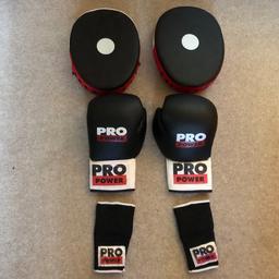 Pro Power boxing gloves, pads and other hand gear set. Can deliver at extra cost (cost of delivery). Open to slight negotiation