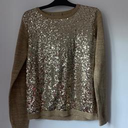 Stunning Glittery& Sequin Jumper
As good as new condition 
Would complete any outfit will glamorous blinks 
Size 12, can be used between size 8-12UK
Note: unfortunately the brand name has been removed