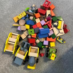 Includes wooden vehicles, people and a town to build with the bricks