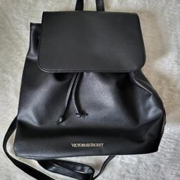 Immaculate Victoria's Secret small backpack. 
Inner drawstrings and black leather surface (faux) without damages throughout