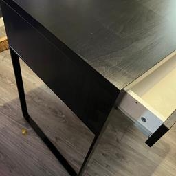 IKEA black computer desk one side closed wood the other metal open leg. Has a large spacious drawer at the front , hole in the top for leads and cables to be tidily threaded through. 

Good condition
Collection only.
