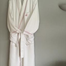 Ladies fully lined white dressing gown bought from Sandy Lane Barbados.
Size medium 120cm from shoulder to hem.
Originally cost £200 and never worn.
This is an exclusive gift for a very lucky lady!
Not available in any shops.