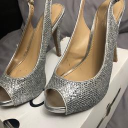 Silver sandals in good condition from top. comes with shoe box