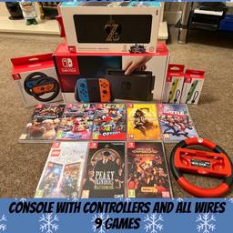 Nintendo Switch with 9 games & 2 x steering wheels