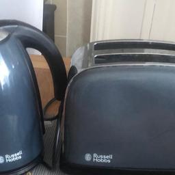 Fully working, grey kettle and toaster. Russell Hobbs. Toaster has a dent on one side as seen in pictures. Has grey tea coffee and sugar canistar you can have too Collection only Cutsyke. £8 for both