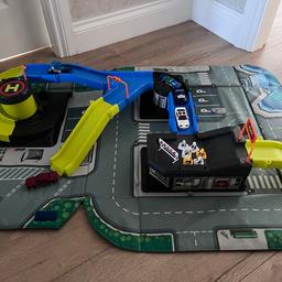 Little garage with hot wheels cars. 
Folds into a carrying bag 
Pet and smoke free home