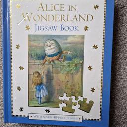 New
Alice in Wonderland 
Jigsaw Book
with 
Seven 48 piece Jigsaws