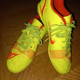 used nike yellow football boots, few scuff marks but over all good condition. size 4. collection br6