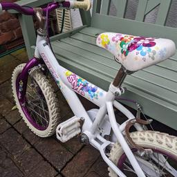 Girls purple & white bike. Steel frame. Front calliper & rear calliper brakes. Hardly used as purchased for daughter who then had a growth spurt & unfortunately outgrew it. However it has been stored in an outhouse for some time so is a little rusty but nothing that a bit of tlc won't sort. Will suit from age 6