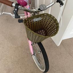 Girls pink bike with basket and bell,very good condition