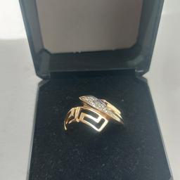 Lovely gold ring with CZ stones. NO OFFERS PRICE INCLUDES POSTAGE
