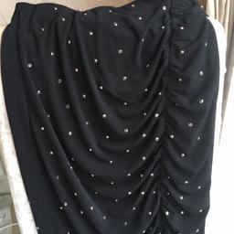 Stunning black skirt with diamanté detail from Coast. Like new. Top quality. Size 10. No zips . Lots of stretch. Perfect for party season or with tights & boots. Smoke & pet free home