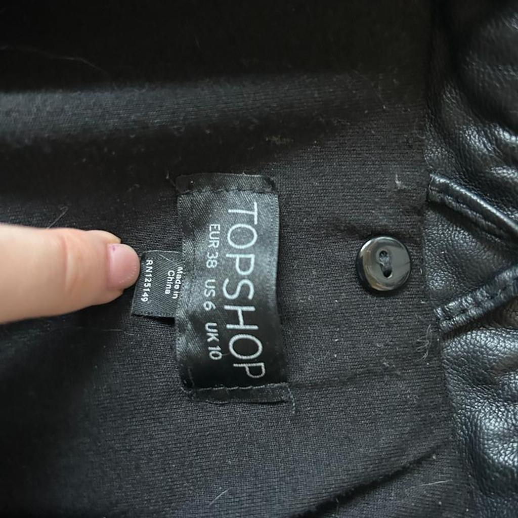Topshop pleather jacket, size 10 but could fit a size 8. Small paint mark on arm (pictured)