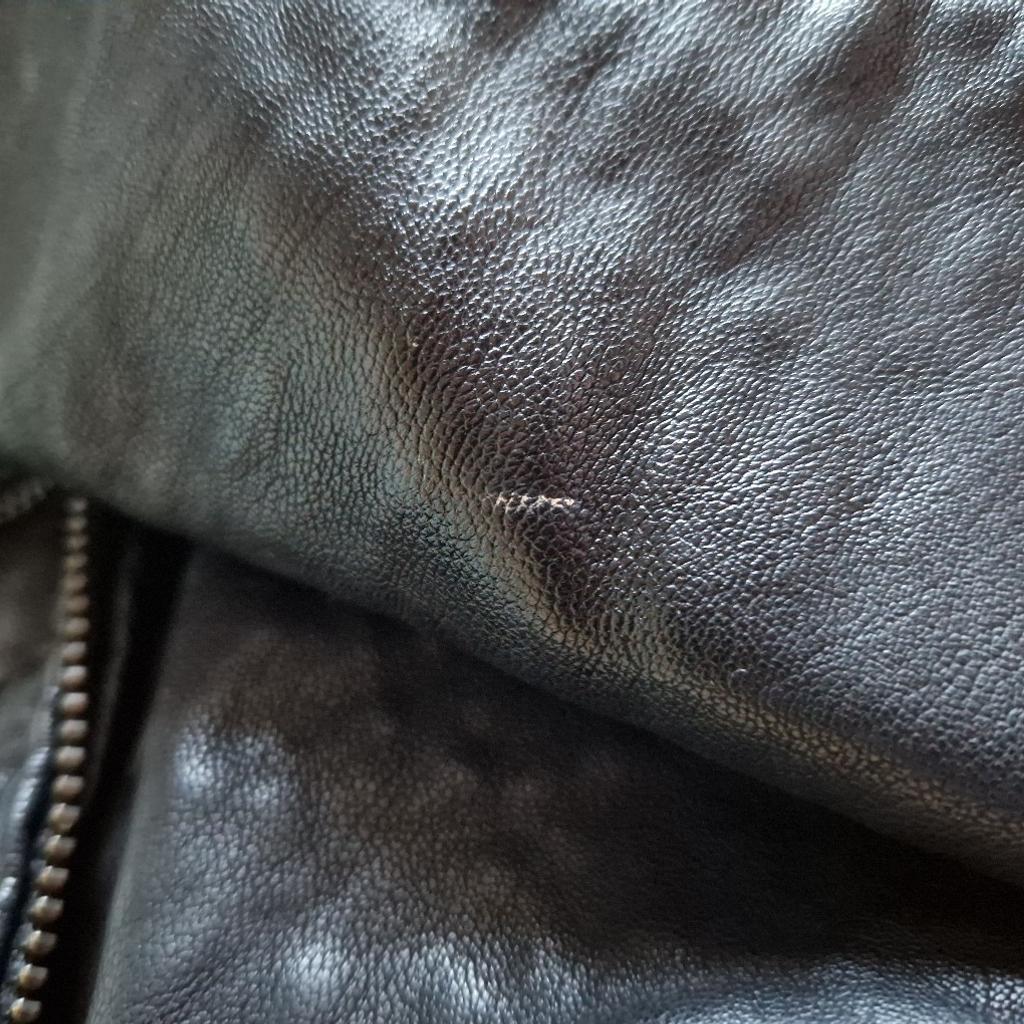 Topshop pleather jacket, size 10 but could fit a size 8. Small paint mark on arm (pictured)